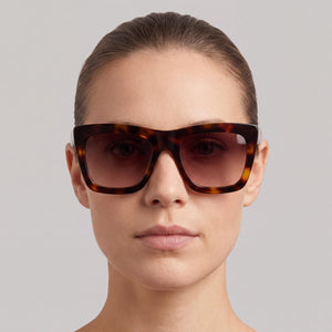 Carolina Herrera 207076 Havana Sunglasses Women — lifestyle wear, city streets and open-air cafes