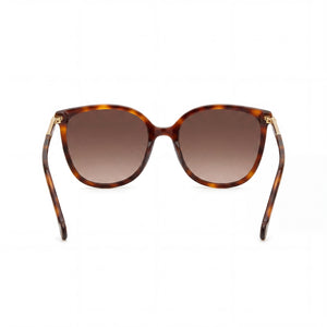 Carolina Herrera Oval Sunglasses Women — side view, Non-Polarized Brown Shaded lens
