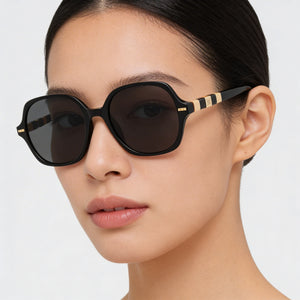 Carolina Herrera HER-0106/S Black Sunglasses Women — lifestyle wear, rooftop evenings and sunset hours