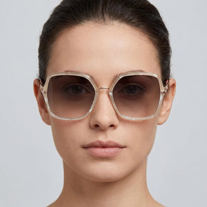 Carolina Herrera Butterfly Sunglasses Unisex — interior view, Non-Polarized lens detail