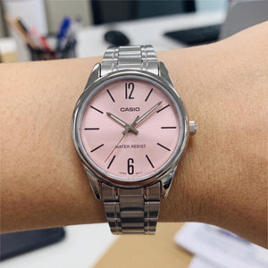 Casio S7232546 Unisex Watch — side view, Stainless Steel case 34mm