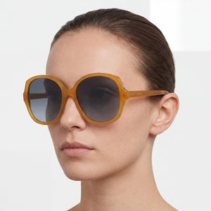 Celine Round Sunglasses Women — side view, Non-Polarized Grey Gradient lens