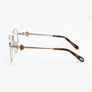 Chopard Round Eyeglasses Women — side view, Silver temples