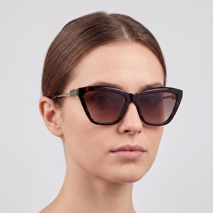 Guess Gu00199 Cat Eye Sunglasses Women — side view, Non-Polarized Gradient Brown lens
