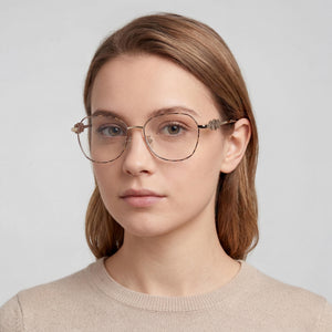 Guess Gu50256-d Gold Eyeglasses Unisex — lifestyle wear, reading and close-up activities