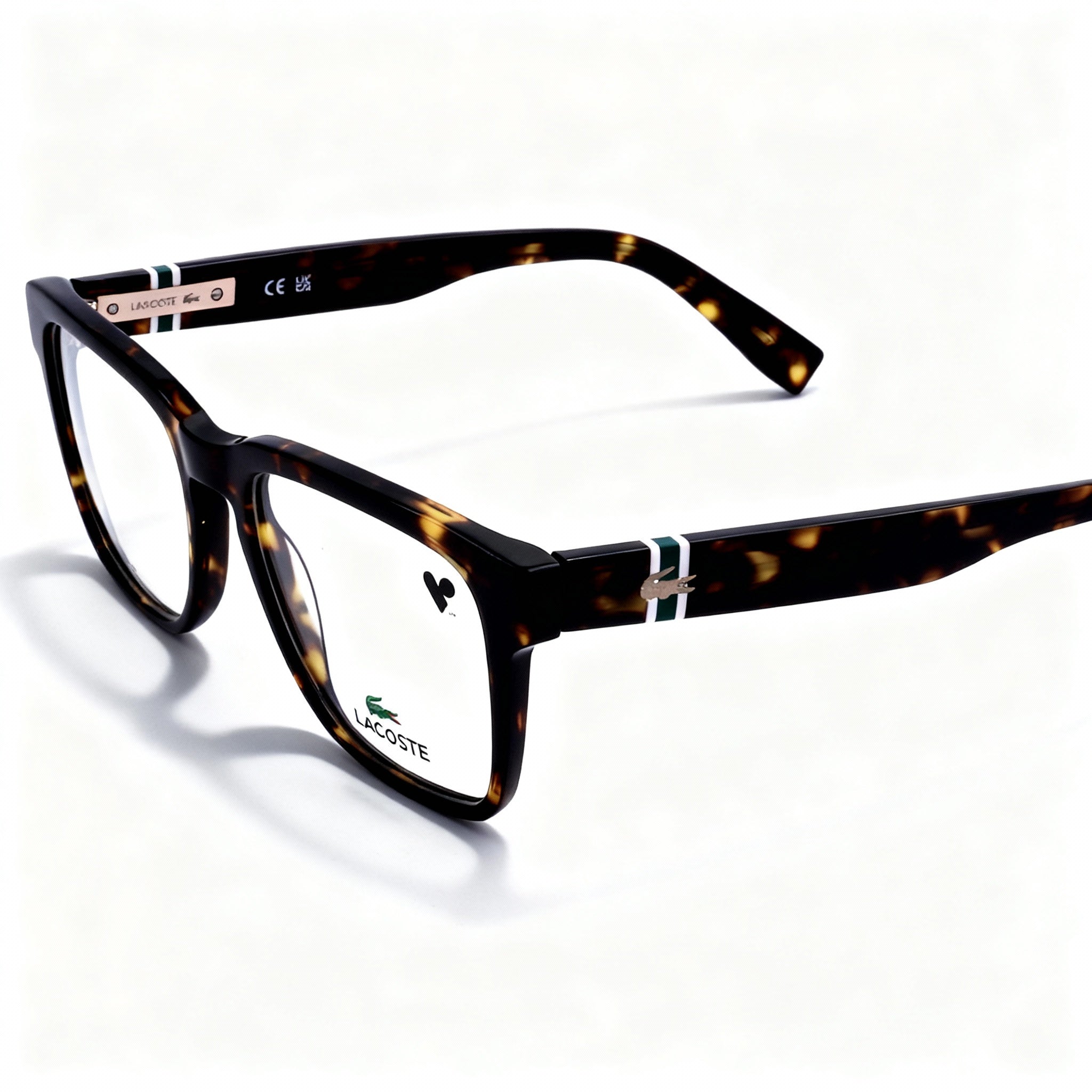 Lacoste Modern Unisex Eyeglasses, crafted with a Dark Havana Acetate Frame, featuring a 53mm Lens Width.