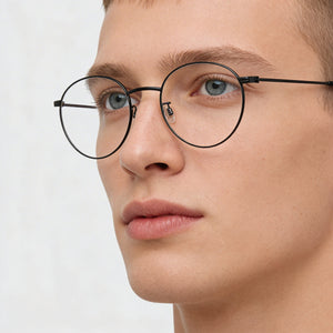 Tommy Hilfiger Round Eyeglasses Unisex — side view, Black Stainless Steel temples