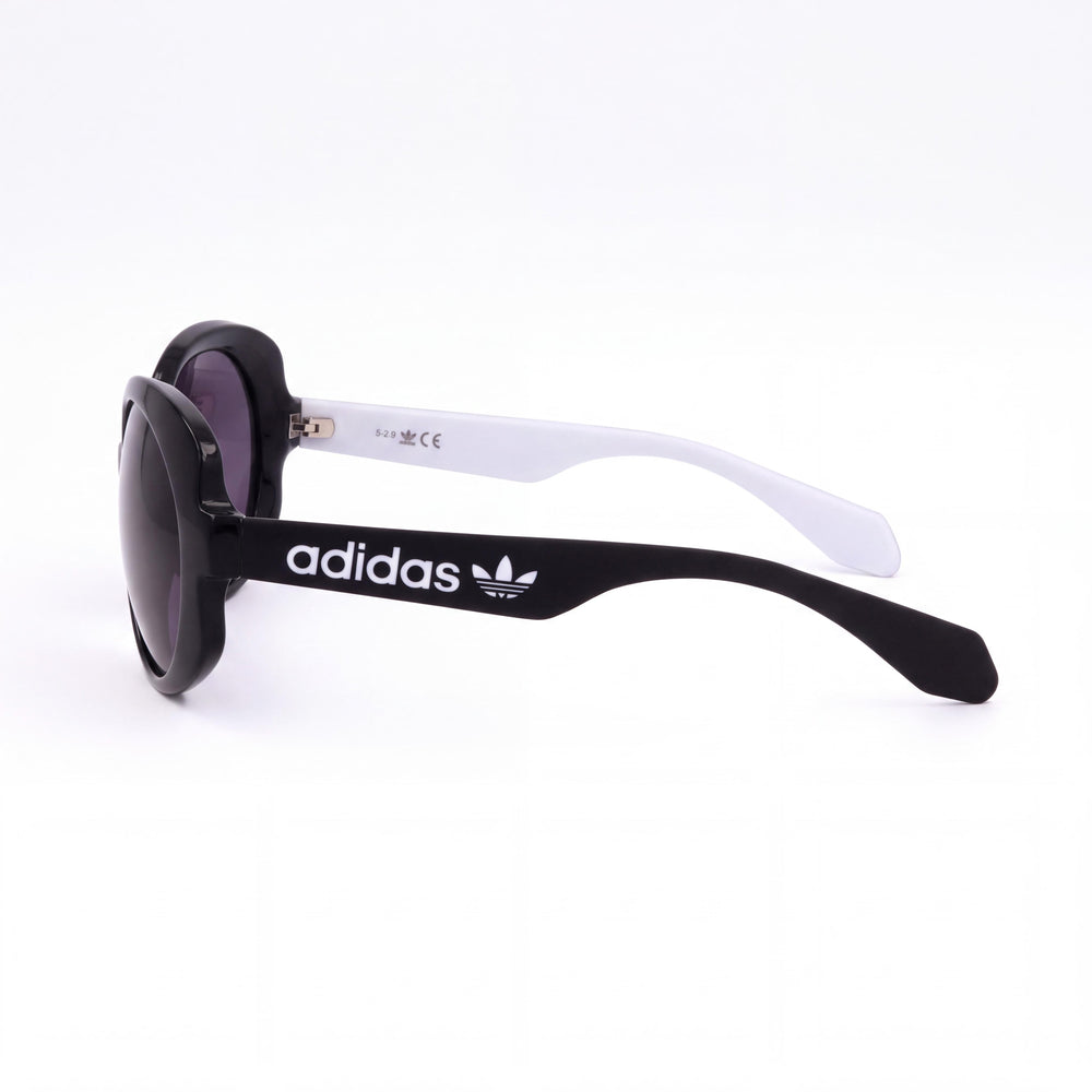 Adidas Or0020 Oval Sunglasses for Women — front view, Plastic frame