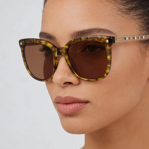 Bebe Rectangle Sunglasses for Women — interior view, Non-Polarized lens detail