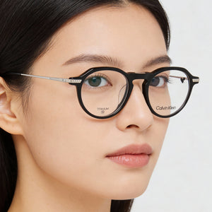 Calvin Klein CK23532T Round Eyeglasses Women — side view, Black Acetate temples