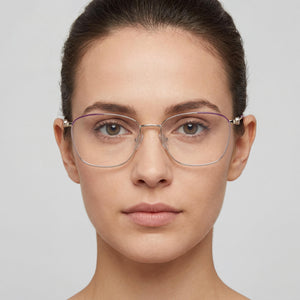 Carolina Herrera CH 0060 Round Eyeglasses Women — side view, Gold Alloy Steel temples