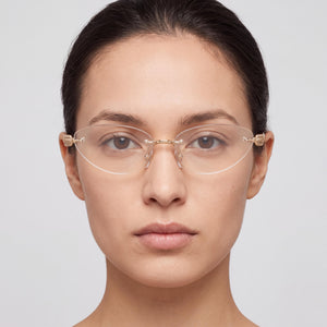 Cartier CT0565O 001 Gold Eyeglasses Women — lifestyle wear, evening writing and late desk work