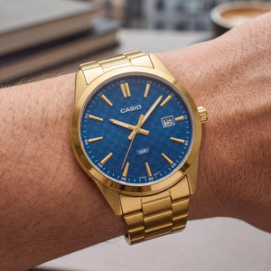 Casio MTP-VD03G-2AUDF Unisex Watch — side view, Gold case