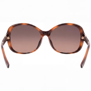 Ferragamo Contemporary Round Sunglasses Women — side view, Non-Polarized Brown Gradient lens