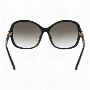 Ferragamo SF744SLA Oval Sunglasses Women — side view, Non-Polarized Gray Gradient lens