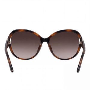 Ferragamo SF770SA Oval Sunglasses Women — side view, Non-Polarized Brown Gradient lens