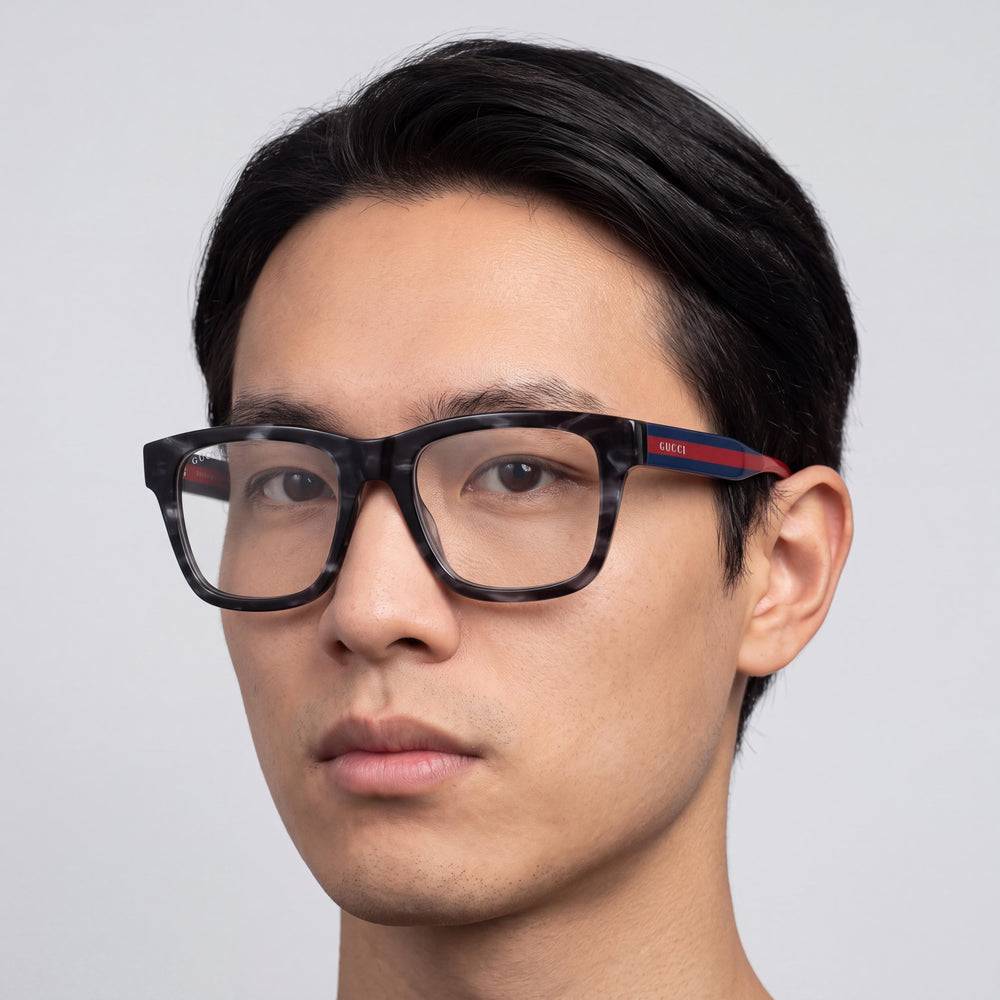 Gucci GG1870O Rectangle Eyeglasses Unisex — side view, Black Acetate temples