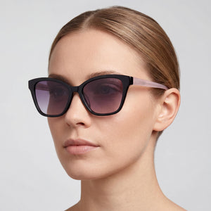Guess Black Sunglasses Women — lifestyle wear, coastal walks and seaside afternoons