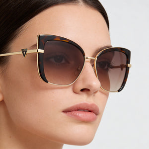Guess GU7633 52F Cat Eye Sunglasses Women — side view, Non-Polarized Brown Gradient lens
