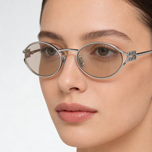 Miu Miu 0MU 52YS Oval Sunglasses for Women — interior view, Non-Polarized lens detail