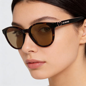 Moschino Brown Sunglasses Women — lifestyle wear, city streets and open-air cafes