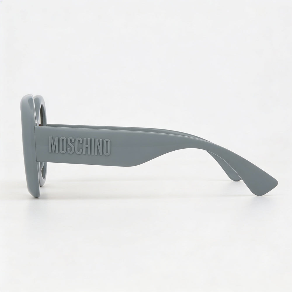 Moschino Oval Sunglasses Women — side view, Non-Polarized Brown Shaded lens