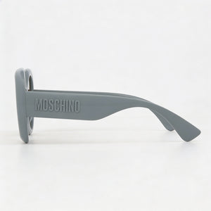 Moschino Oval Sunglasses Women — side view, Non-Polarized Brown Shaded lens