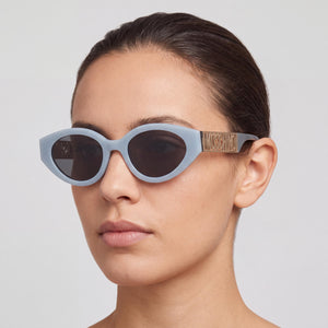 Moschino MOS160/S Oval Sunglasses Women — side view, Non-Polarized Grey lens