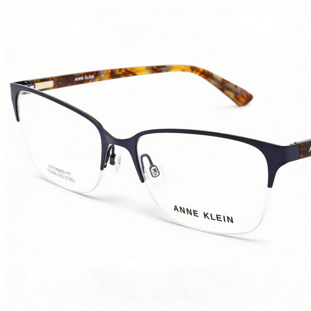 Gafas Anne Klein Ak5083 para hombre con lentes de policarbonato transparente y montura de metal azul marino, talla 55-17-140