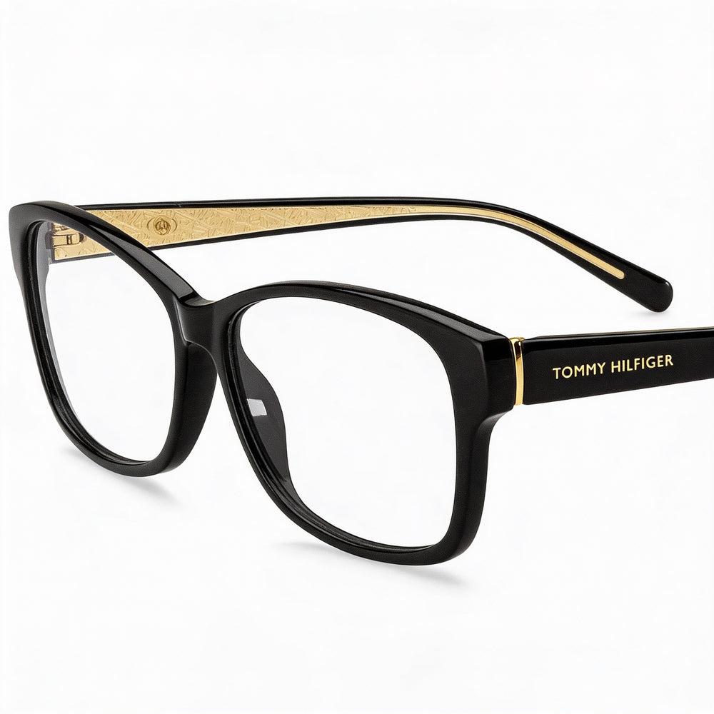 Tommy Hilfiger T. Hilfiger 1779 Women's Sunglasses featuring a Havana Plastic Frame and 53mm Lens Width