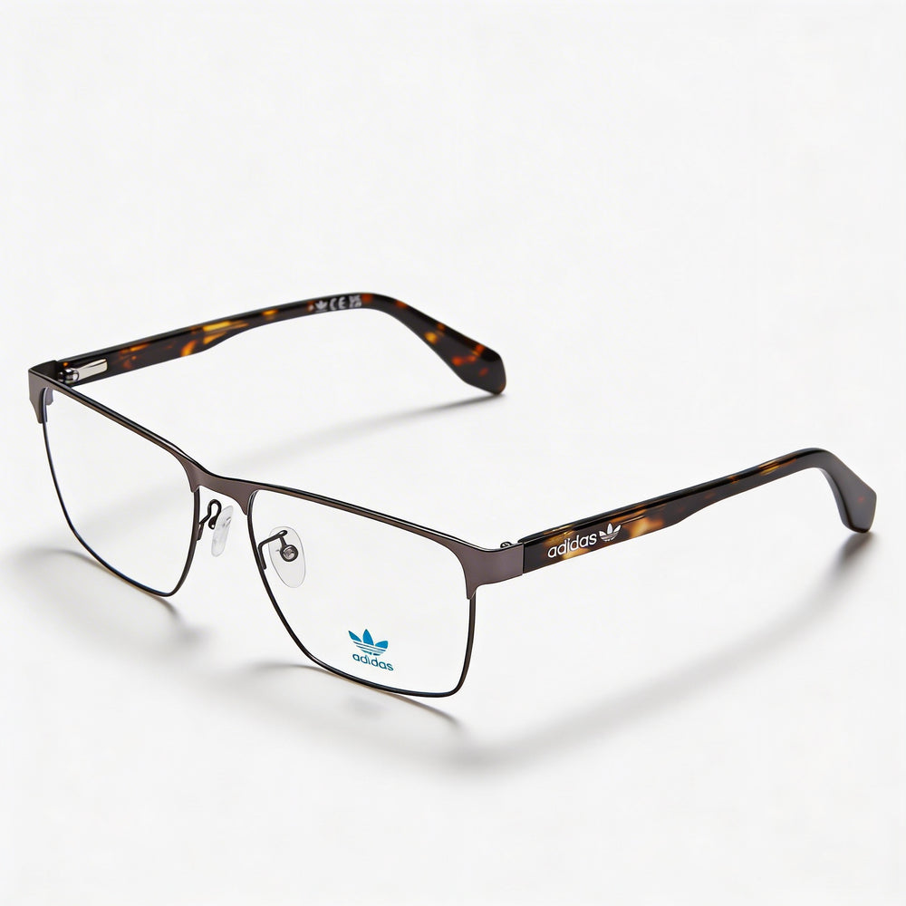Gafas Adidas Modern para hombre con montura metálica, color bronce brillante con lentes de policarbonato transparentes, tamaño 55-16-140