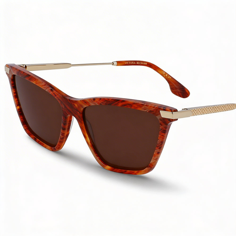Gafas de sol modernas Victoria Beckham para mujer con montura de acetato en color ámbar y lentes de policarbonato de 57 mm.