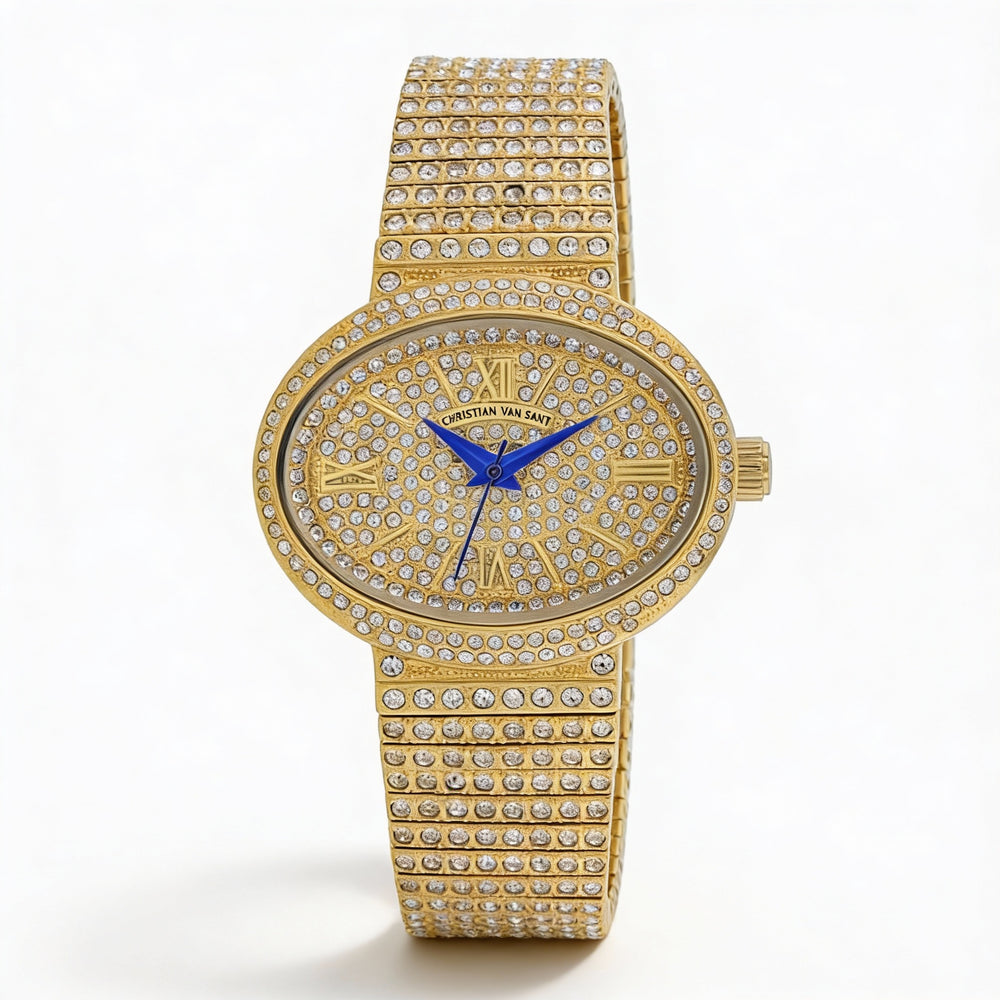 Reloj de cuarzo Christian Van Sant para mujer en tono dorado con cristales en el bisel y pulsera de acero inoxidable.