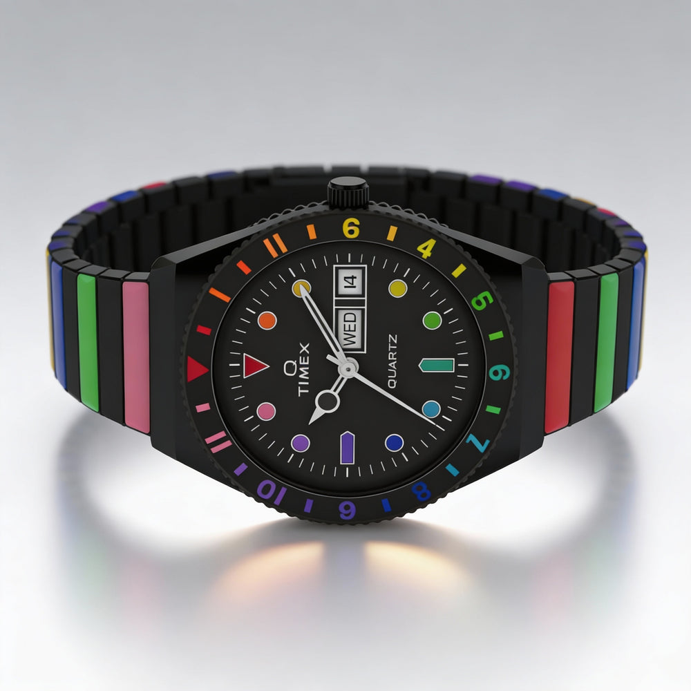 Reloj Timex Q Rainbow de 36 mm para mujer, de acero inoxidable negro, de cuarzo, con cristal mineral, resistente al agua hasta 50 m y correa extensible.