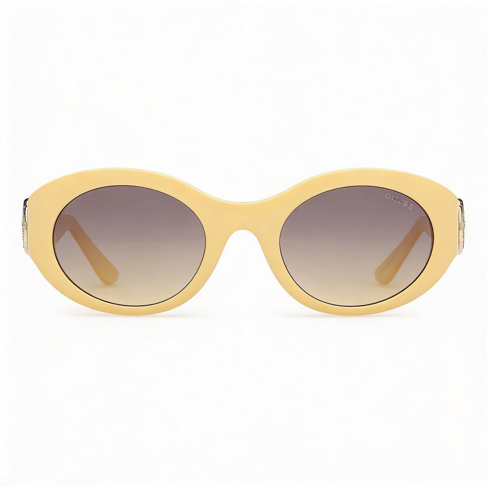 GUESS Women's Oval Peony Plastic Sunglasses, Shiny Light Yellow Frame, Gradient Smoke Lenses, Non-Polarized, 100% UV Protection, 53mm