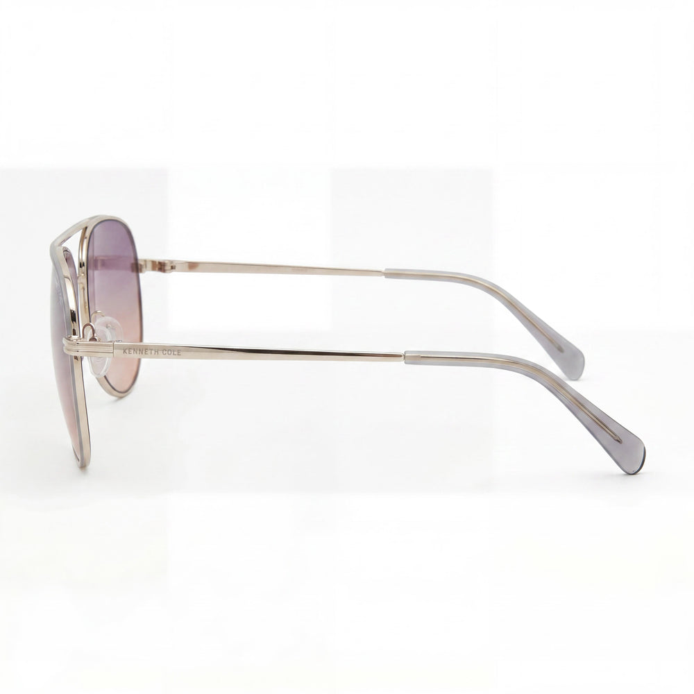 Gafas de sol de aviador para mujer MARCOLIN USA, INC con montura metálica brillante, lentes ahumadas y 100 % protección UV