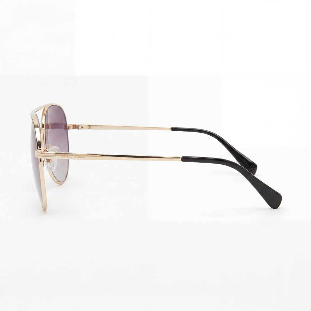 MARCOLIN USA, INC Gafas de sol de aviador para mujer con montura de metal brillante y lentes ahumadas, 100 % protección UV