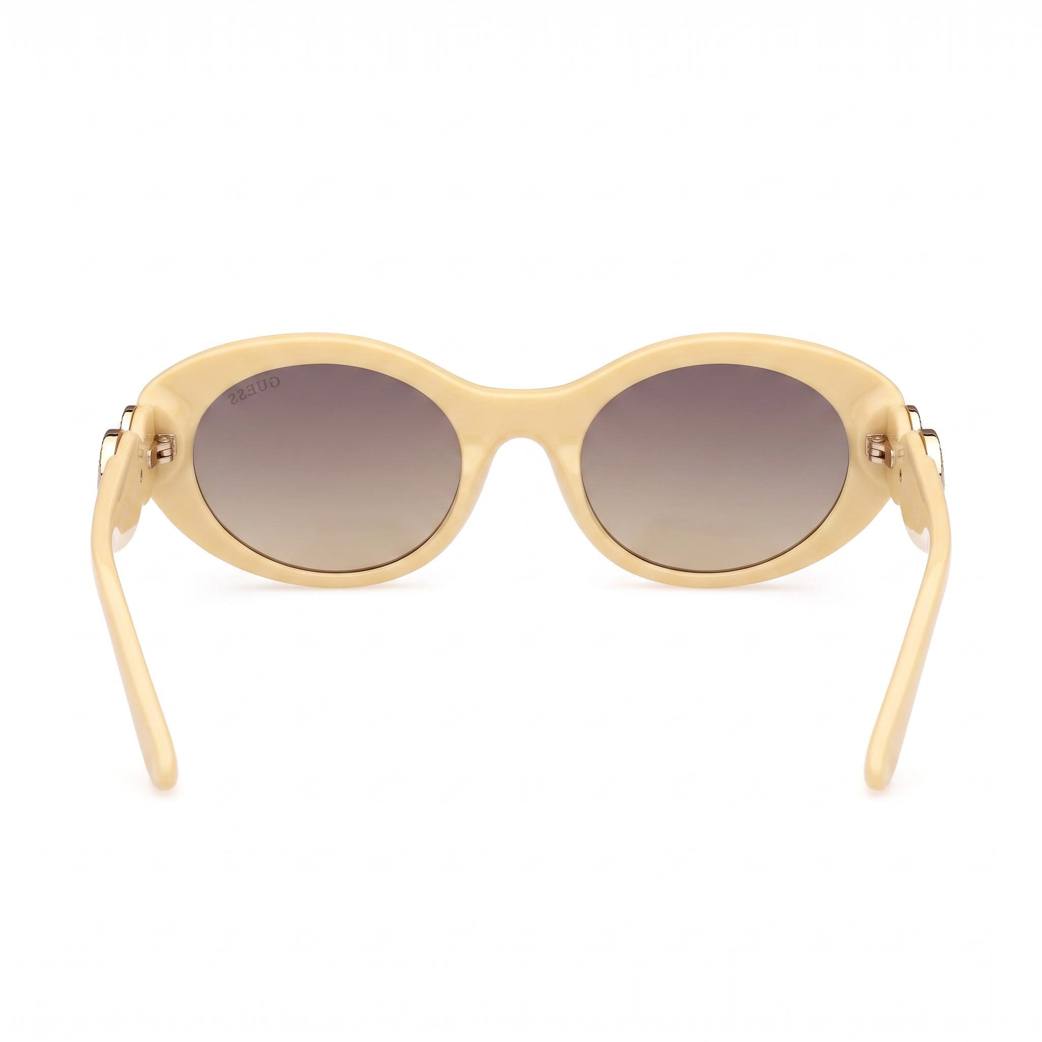 GUESS Women's Oval Peony Plastic Sunglasses, Shiny Light Yellow Frame, Gradient Smoke Lenses, Non-Polarized, 100% UV Protection, 53mm, Photo 2