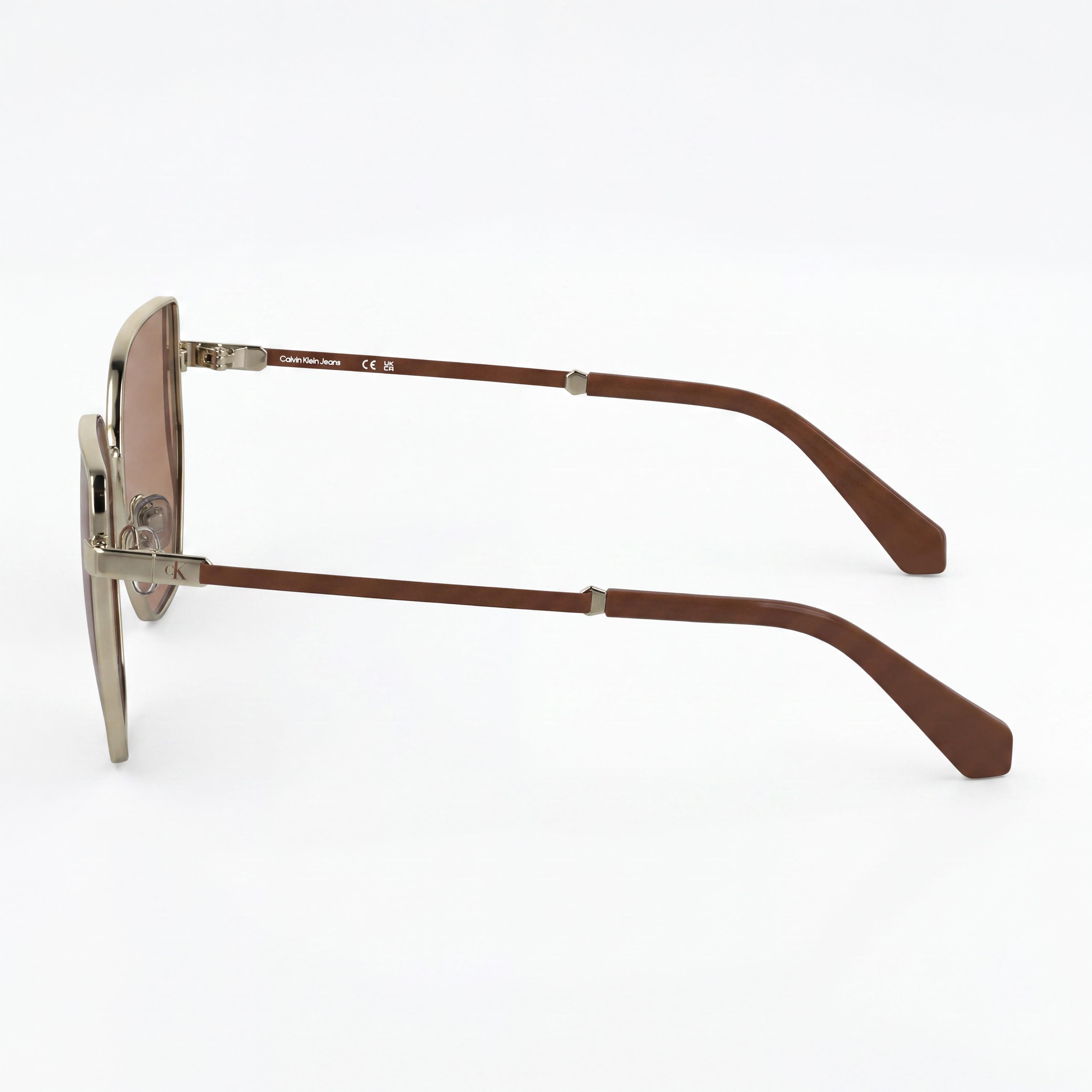 Calvin Klein Ckj25209s Gafas de sol de policarbonato con montura de metal color oro claro y protección UV para mujer de 57 mm, Photo 3