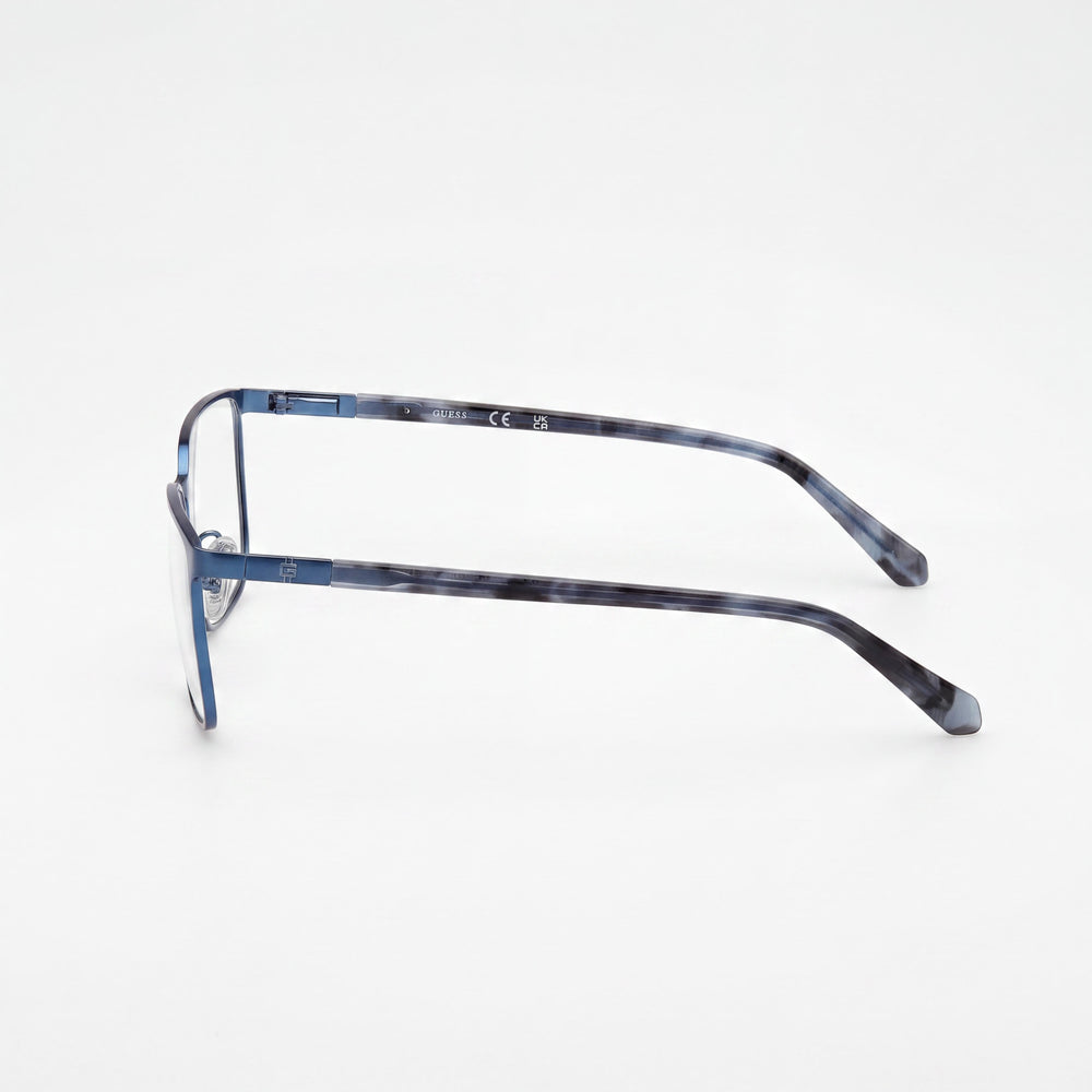 GUESS Gu50243 Gafas para hombre con montura de metal azul mate/brillante y lentes de policarbonato, ancho de lente 56 mm, puente 18 mm, longitud de patilla 145 mm