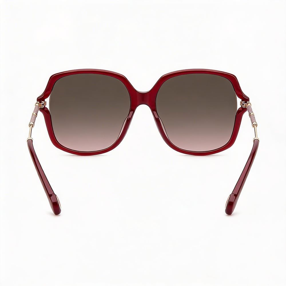 Carolina Herrera Casual Gafas de sol con protección UV de mariposa de plástico sombreado marrón burdeos para mujer 58