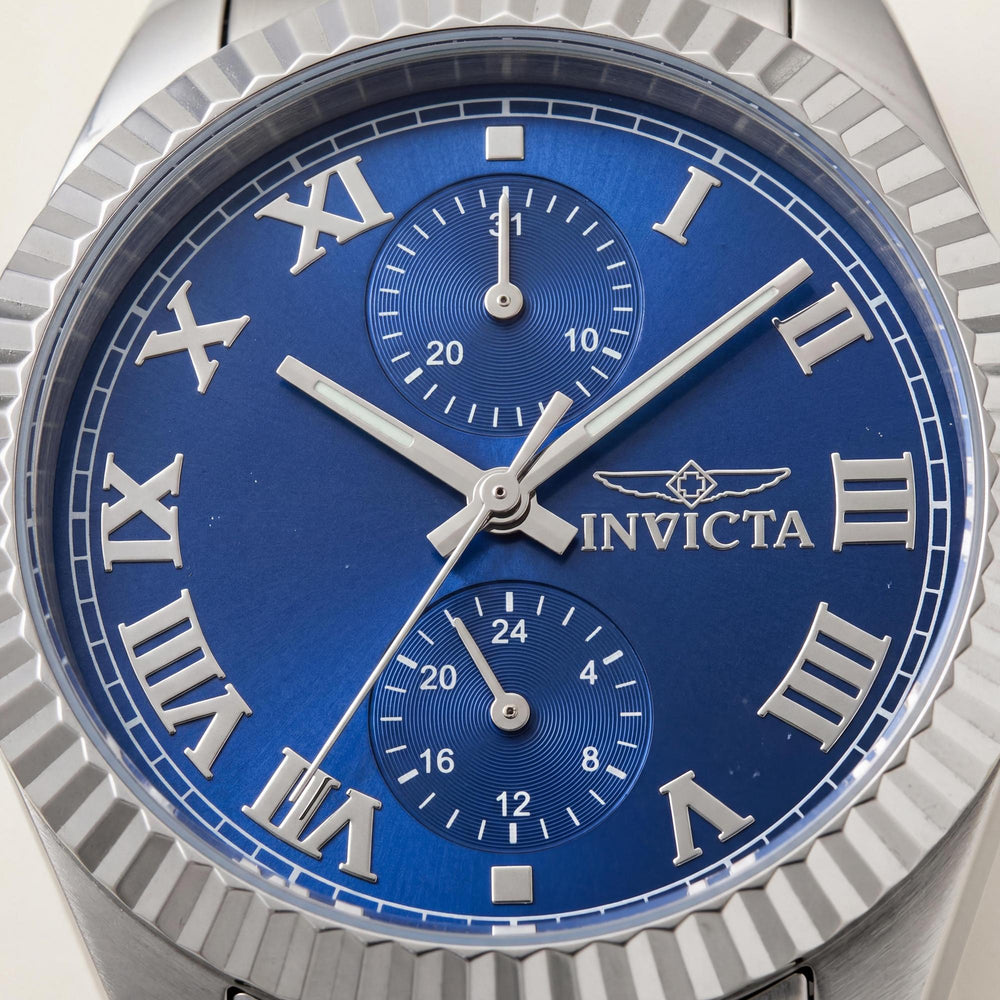 Reloj unisex Invicta Specialty 47437 de acero inoxidable plateado con esfera azul y cuarzo de 36 mm.