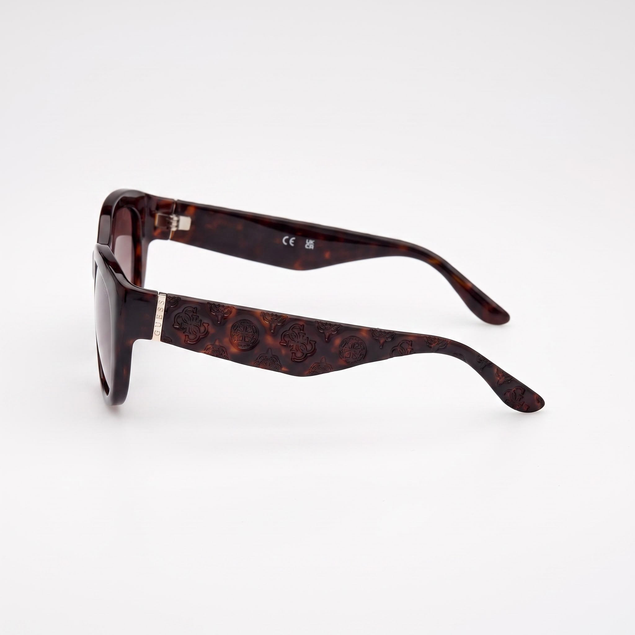 GUESS Moderne Gafas de sol de plástico marrón oscuro para mujer con montura de policarbonato y lentes degradadas de color marrón, protección UV 400, 60-16-125, Photo 3
