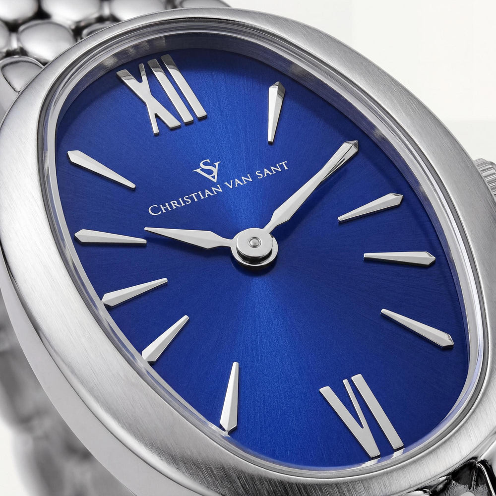 Reloj de cuarzo Christian Van Sant para mujer con esfera azul, caja y pulsera de acero inoxidable, resistente al agua.