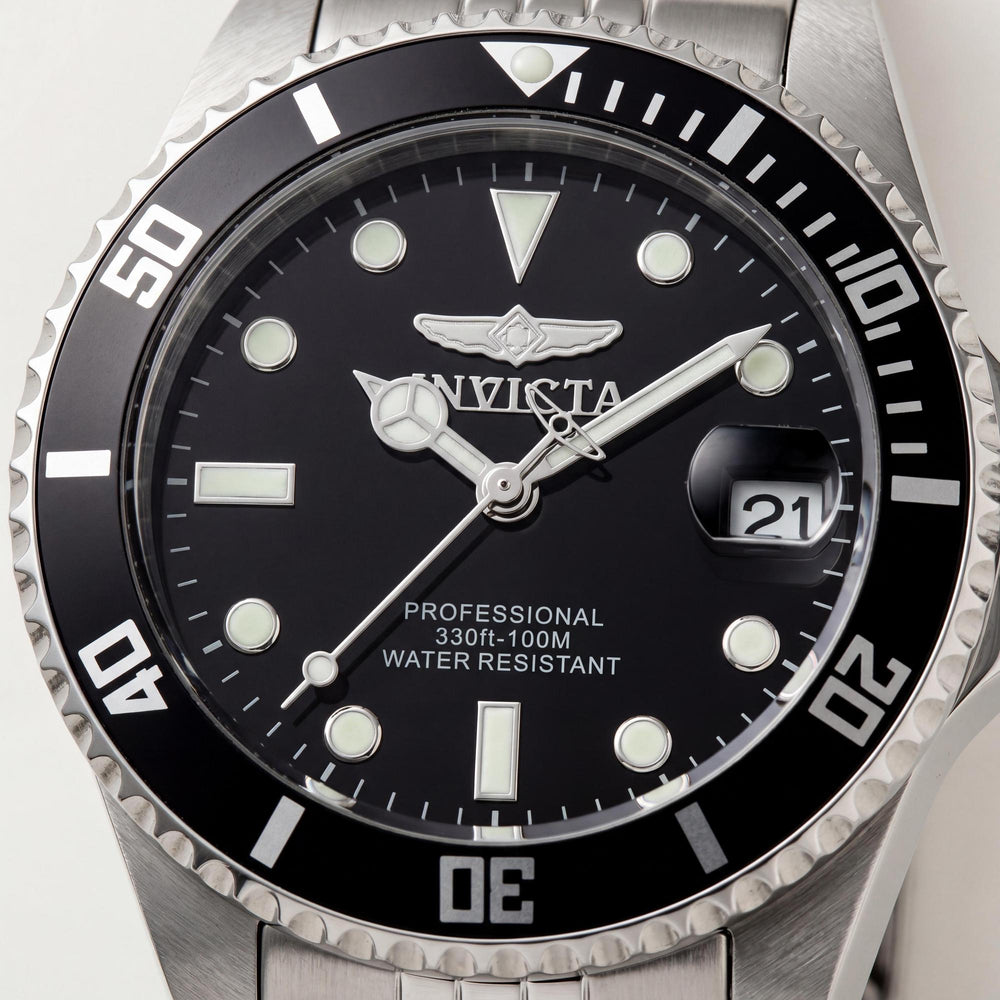 Reloj Invicta Pro Diver para mujer, caja de acero inoxidable plateada de 34 mm, esfera negra, cuarzo, fecha, resistente al agua hasta 100 m.