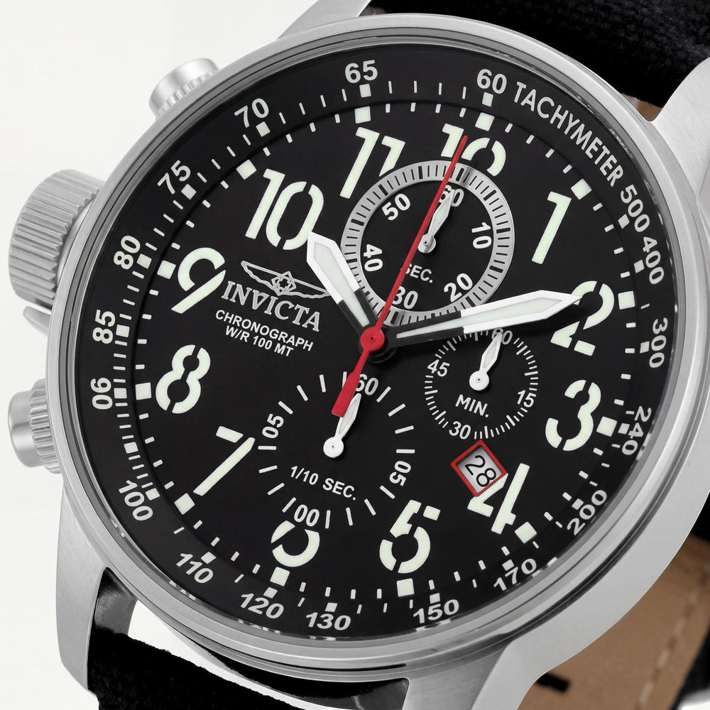 Reloj Invicta Casual para hombre de 46 mm en acero inoxidable plateado y negro con correa de lona negra, cronómetro y manecillas luminosas.