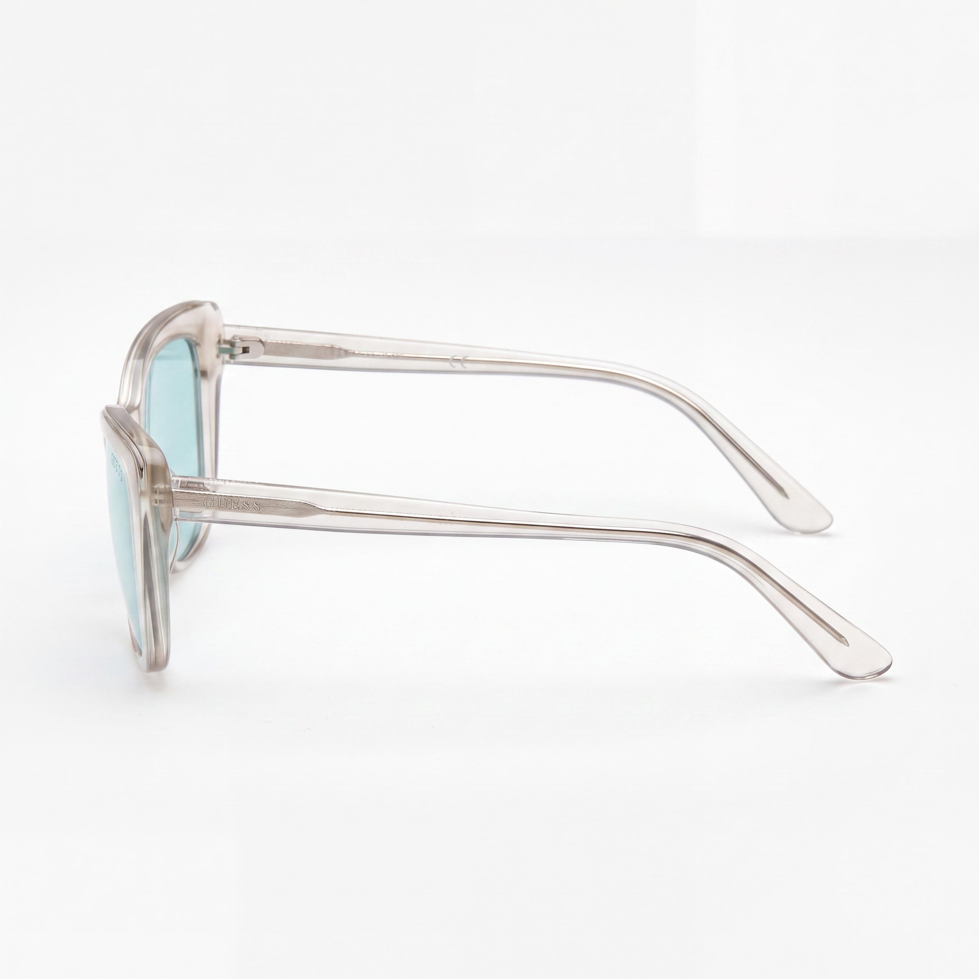 GUESS Women's Classic Plastic Sunglasses, Crystal Blue Frame, Blue Lenses, 100% UV Protected, 55-16-140mm, Photo 3