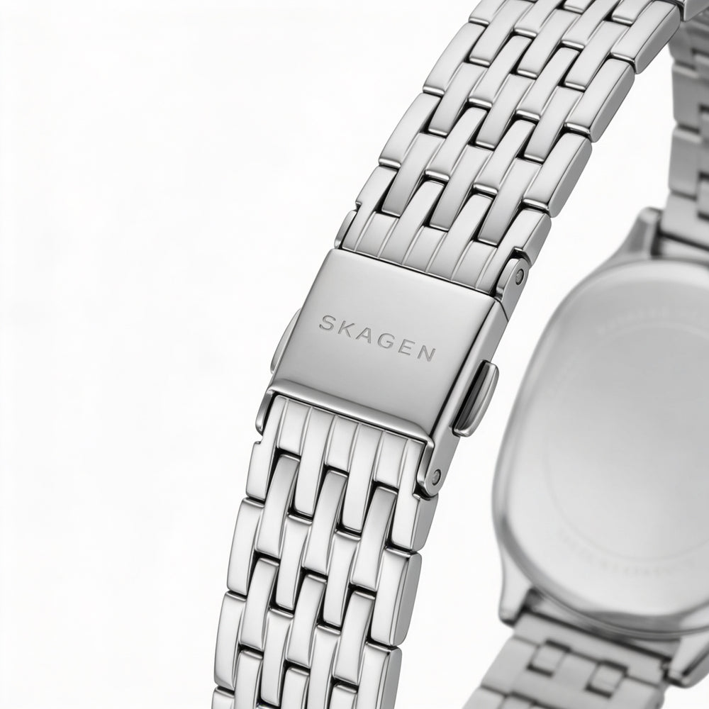 Reloj Skagen Mellem Lille para mujer, de acero inoxidable plateado, resistente a los arañazos, con esfera dorada con efecto rayos de sol y caja de 28 mm.