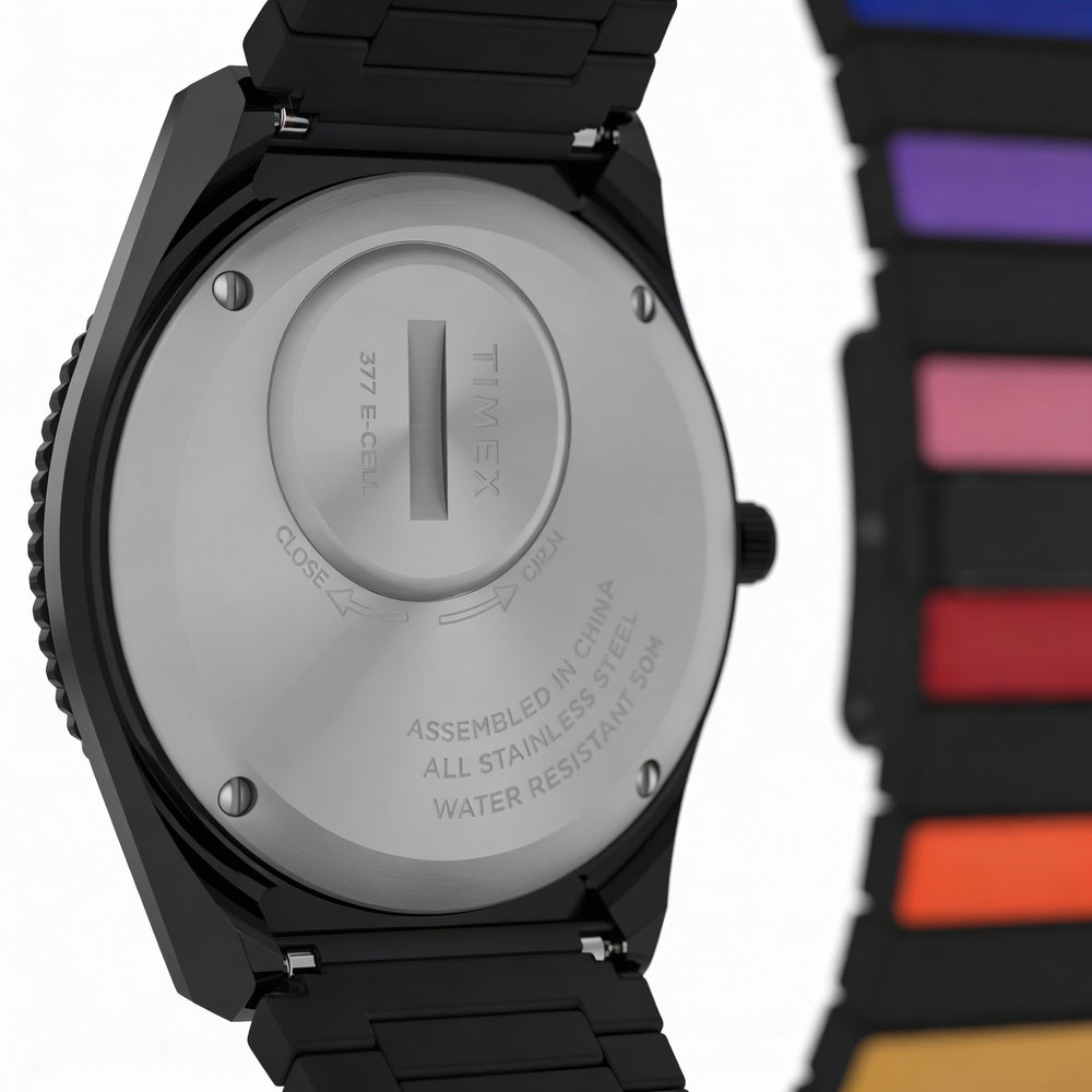 Reloj Timex Q Rainbow de 36 mm para mujer, de acero inoxidable negro, de cuarzo, con cristal mineral, resistente al agua hasta 50 m y correa extensible.