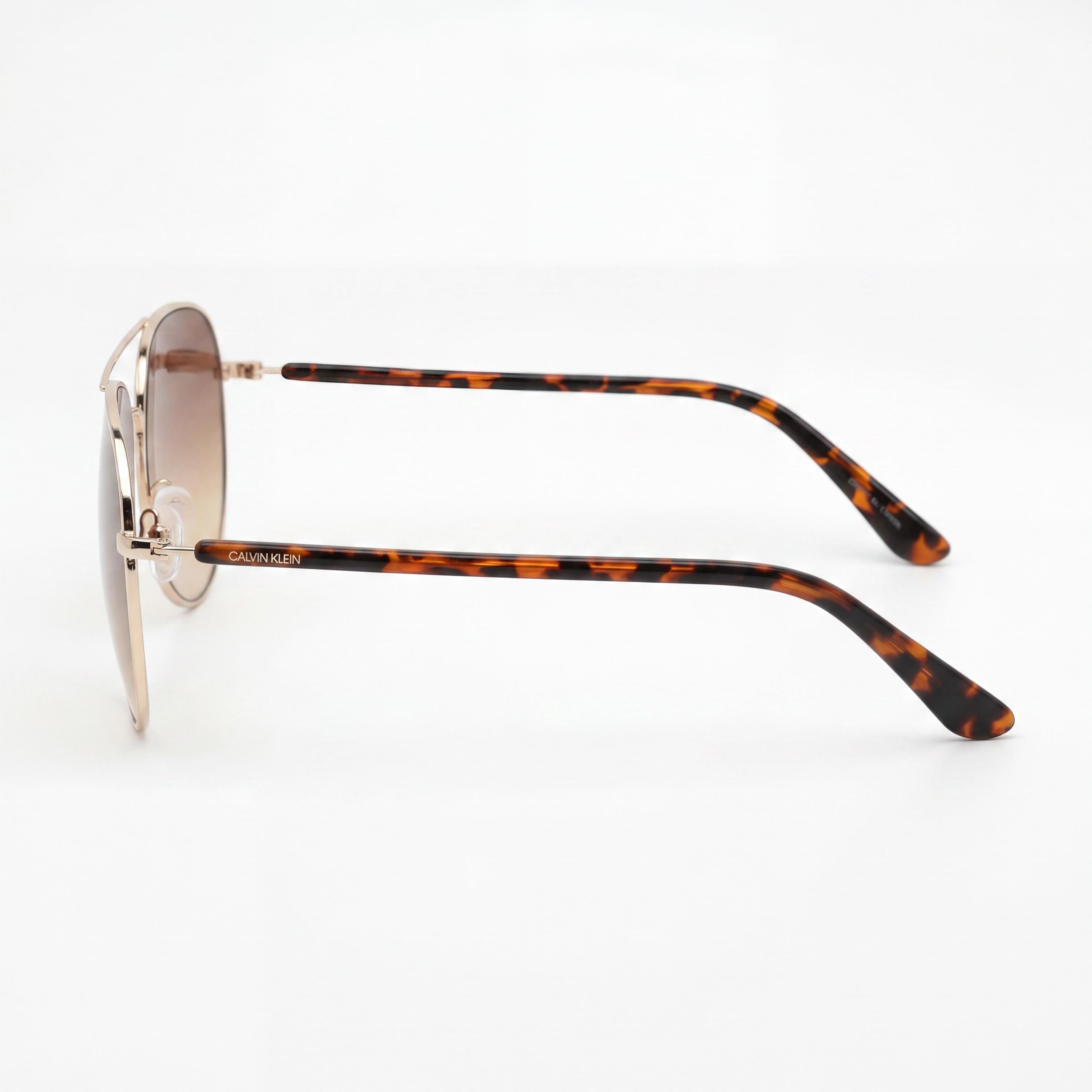 Gafas de sol unisex Calvin Klein Ck19314s de policarbonato con montura dorada y marrón degradado y lentes marrones degradadas de 60 mm, Photo 3